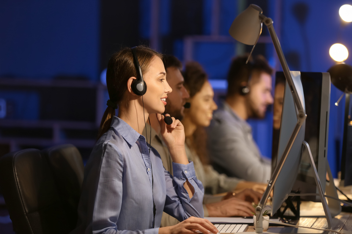 Call Center Agents Wearing Headsets 